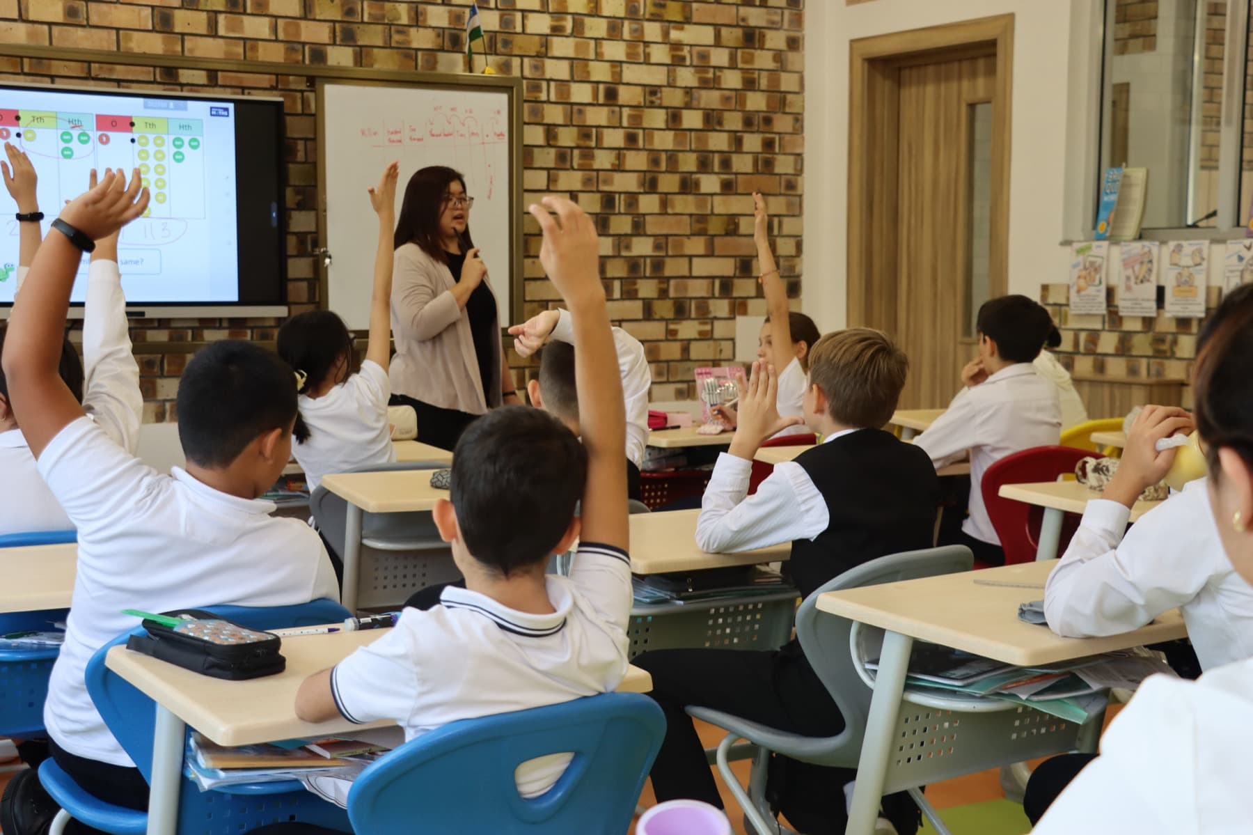 Pupils taking an active part in the lesson
